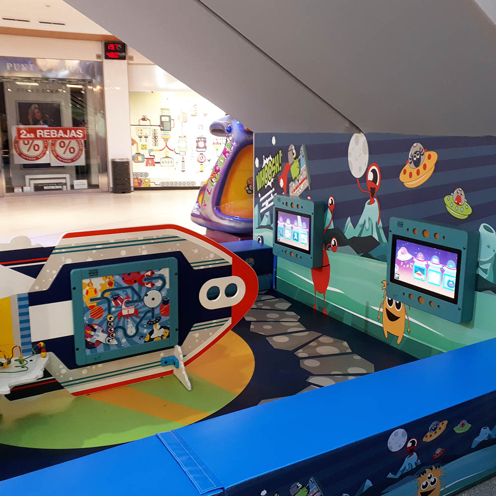 This image shows a custom kids corner within a shopping center in Spain
