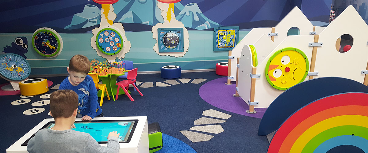 This image shows a custom kids corner in a shopping center