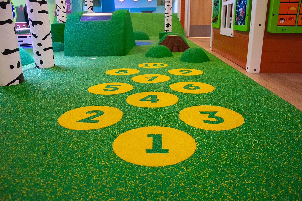 Binnenspeeltuin met kinderhoek Binnenspeeltuin met kinderhoek
